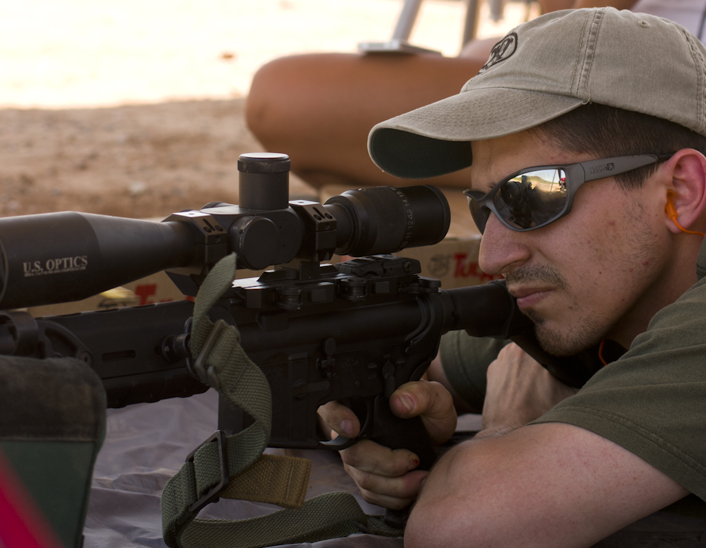 A Marine infantryman and marksmanship instructor prepares to test accuracy.