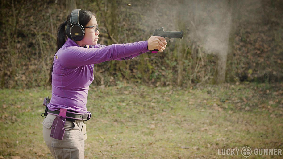 Annette Evans shooting at the range with Lucky Gunner